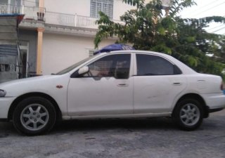 Mazda 323 1997 - Cần bán Mazda 323 đời 1997, màu trắng, nhập khẩu nguyên chiếc, 90 triệu