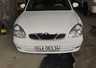 Daewoo Nubira 2003 - Cần bán gấp Daewoo Nubira sản xuất 2003, màu trắng, xe nhập chính chủ