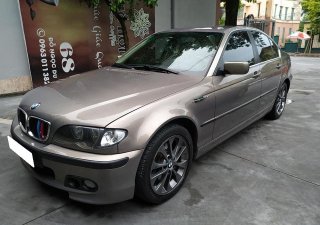 BMW 3 Series  325i 2006 - Cần bán BMW 325i 2006, màu vàng