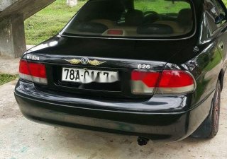Mazda 626 1996 - Cần bán lại xe Mazda 626 sản xuất 1996, màu đen, xe nhập