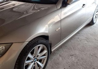 BMW 3 Series 320i 2010 - Chính chủ bán xe BMW 320i năm 2010, màu vàng cát, nhập khẩu