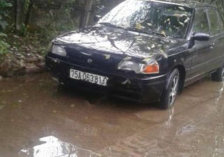 Mazda 323 1.6 MT 1997 - Cần bán xe Mazda 323 1.6 MT đời 1997, màu đen, xe nhập
