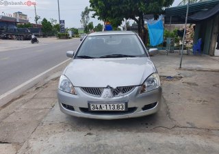 Mitsubishi Lancer GLX 1.6 AT 2004 - Cần bán Mitsubishi Lancer GLX 1.6 AT đời 2004, màu bạc  