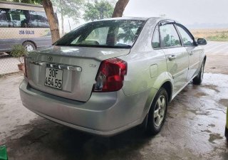 Daewoo Lacetti 2009 - Cần bán Daewoo Lacetti đời 2009, màu bạc xe gia đình, giá tốt