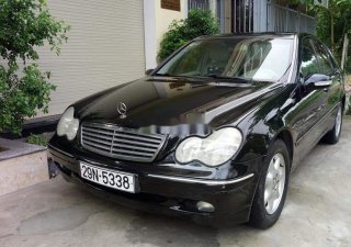 Mercedes-Benz C class 2002 - Cần bán lại xe Mercedes đời 2002, màu đen xe nguyên bản