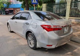 Toyota Corolla      2016 - Bán Toyota Corolla sản xuất năm 2016, màu bạc giá cạnh tranh