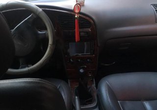 Kia Spectra   2004 - Bán Kia Spectra 1.6 MT sản xuất năm 2004, màu bạc, số sàn