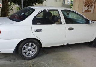 Kia Spectra   2003 - Bán Kia Spectra 1.6 MT năm 2003, màu trắng, xe gia đình