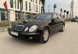 Mercedes-Benz E class   2003 - Bán xe Mercedes E class đời 2003, màu đen, 240 triệu