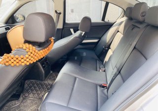 BMW 3 Series   2010 - Bán ô tô BMW 320i đời 2010, màu bạc, nhập khẩu