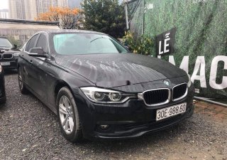 BMW 3 Series   2015 - Bán ô tô BMW 320i sản xuất 2015, màu đen, form 2016