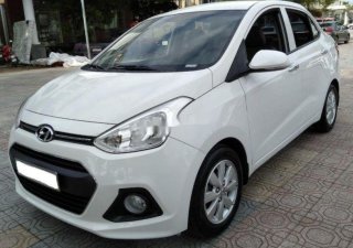 Hyundai Grand i10 2017 - Bán Hyundai Grand i10 1.2AT đời 2017, màu trắng, nhập khẩu nguyên chiếc xe gia đình