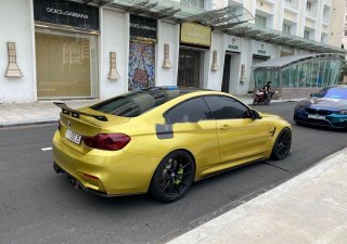 BMW M4   2017 - Bán ô tô BMW M4 đời 2017, màu vàng, xe nhập còn mới