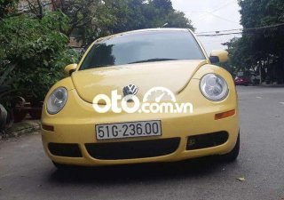Volkswagen New Beetle   2007 - Cần bán xe Volkswagen New Beetle sản xuất 2007, màu vàng, nhập khẩu nguyên chiếc