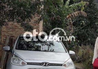 Hyundai Grand i10    2015 - Bán Hyundai Grand i10 năm sản xuất 2015, màu bạc, nhập khẩu  