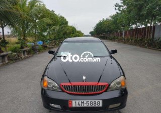 Daewoo Magnus AT 2004 - Cần bán xe Daewoo Magnus AT sản xuất năm 2004, màu đen số tự động, giá chỉ 125 triệu