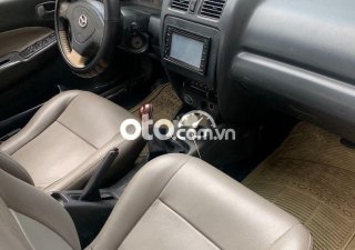 Mazda 323 MT 2000 - Bán Mazda 323 MT năm 2000, màu trắng, nhập khẩu nguyên chiếc, giá tốt