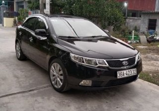 Kia Forte AT 2011 - Bán xe Kia Forte AT sản xuất năm 2011, màu đen 
