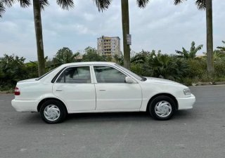 Toyota Corolla MT 2001 - Bán ô tô Toyota Corolla MT sản xuất 2001, màu trắng, giá chỉ 99 triệu