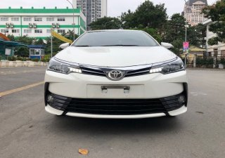 Toyota Corolla 2019 - Cần bán lại xe Toyota Corolla Altis sản xuất 2019, màu trắng, giá tốt