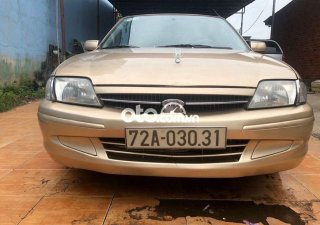 Ford Laser   MT 2001 - Bán xe Ford Laser MT năm sản xuất 2001, màu nâu