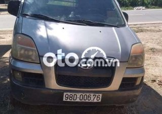 Hyundai Grand Starex MT 2004 - Bán ô tô Hyundai Grand Starex MT sản xuất 2004, màu bạc, nhập khẩu