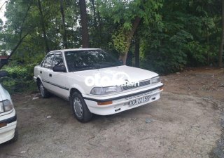 Toyota Corolla   MT 1989 - Bán xe Toyota Corolla MT sản xuất 1989, màu trắng, 50 triệu