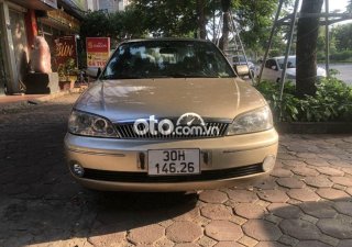 Ford Laser MT 2002 - Cần bán xe Ford Laser MT năm 2002, màu nâu