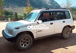 Suzuki Vitara MT 1993 - Cần bán gấp Suzuki Vitara MT năm sản xuất 1993, màu trắng, nhập khẩu nguyên chiếc xe gia đình