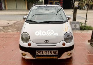 Daewoo Matiz SE 2007 - Cần bán xe Daewoo Matiz SE sản xuất 2007, màu trắng xe gia đình 