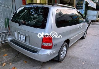 Kia Carnival  GS 2005 - Bán Kia Carnival GS năm 2005, màu bạc, nhập khẩu nguyên chiếc số sàn