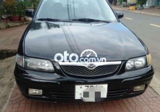 Mazda 626  MT 2000 - Cần bán xe Mazda 626 MT năm sản xuất 2000, màu đen, nhập khẩu nguyên chiếc 