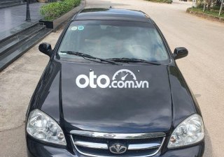 Daewoo Lacetti EX 2009 - Cần bán Daewoo Lacetti EX năm 2009, màu đen xe gia đình