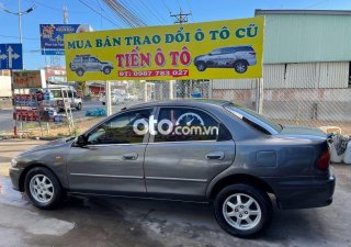 Mazda 323  GLX 1998 - Cần bán gấp Mazda 323 GLX năm sản xuất 1998, màu xám, giá chỉ 60 triệu