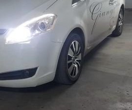 Luxgen M7 2010 - Cần bán gấp Luxgen M7 sản xuất năm 2010, màu trắng, nhập khẩu số tự động