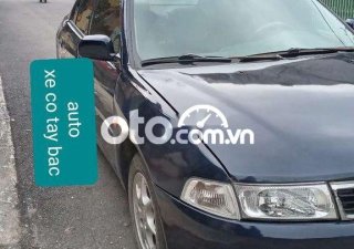 Mitsubishi Lancer 2002 - Cần bán gấp Mitsubishi Lancer iO1.8 sản xuất 2002