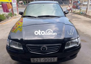 Mazda 626   MT 2002 - Cần bán gấp Mazda 626 MT năm 2002, màu đen