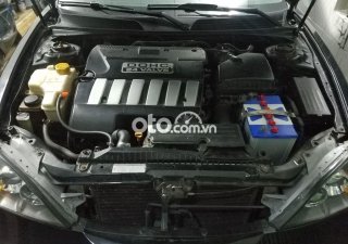 Daewoo Magnus 2005 - Cần bán xe Daewoo Magnus 2.0 năm 2005, màu đen, nhập khẩu nguyên chiếc, 148tr