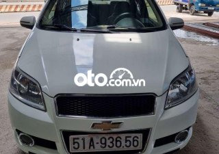 Chevrolet Aveo LTZ 2014 - Cần bán lại xe Chevrolet Aveo LTZ sản xuất năm 2014, màu trắng số tự động, giá 245tr