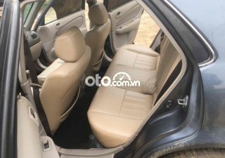 Toyota Corolla 1998 - Cần bán lại xe Toyota Corolla 1.6 GLi năm sản xuất 1998, màu xám, 98tr
