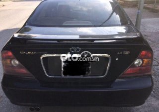 Daewoo Magnus 2004 - Cần bán xe Daewoo Magnus 2.5AT sản xuất 2004, màu đen, chính chủ