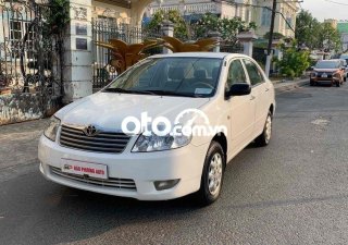 Toyota Corolla 2004 - Cần bán Toyota Corolla sản xuất năm 2004, màu trắng, nhập khẩu nguyên chiếc