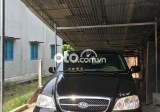 Kia Carnival 2006 - Bán ô tô Kia Carnival sản xuất năm 2006, màu đen
