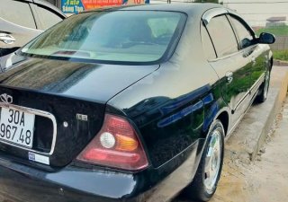 Daewoo Magnus 2005 - Cần bán Daewoo Magnus năm sản xuất 2005, màu xanh lam số tự động