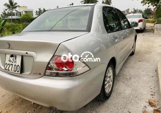Mitsubishi Lancer 2004 - Cần bán xe Mitsubishi Lancer năm 2004, màu bạc, nhập khẩu số tự động