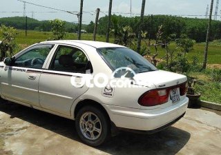 Mazda 323 2000 - Màu trắng