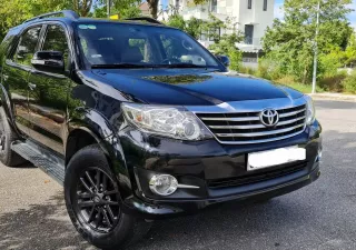 Toyota Fortuner 2015 - Chính chủ bán xe Toyota Fortuner đời 2015 màu đen nội thất kem, 2.7 một cầu máy xăng số tự động.