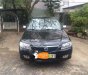 Mazda 323F 1.6 MT 2004 - Em cần bán xe Mazda 323F 1.6 MT sản xuất 2004, màu đen xe gia đình