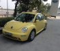 Volkswagen Beetle 2004 - Mình bán xe Volkswagen Beetle 2004, màu vàng, nhập khẩu chính hãng