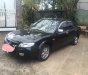Mazda 323F 1.6 MT 2004 - Em cần bán xe Mazda 323F 1.6 MT sản xuất 2004, màu đen xe gia đình